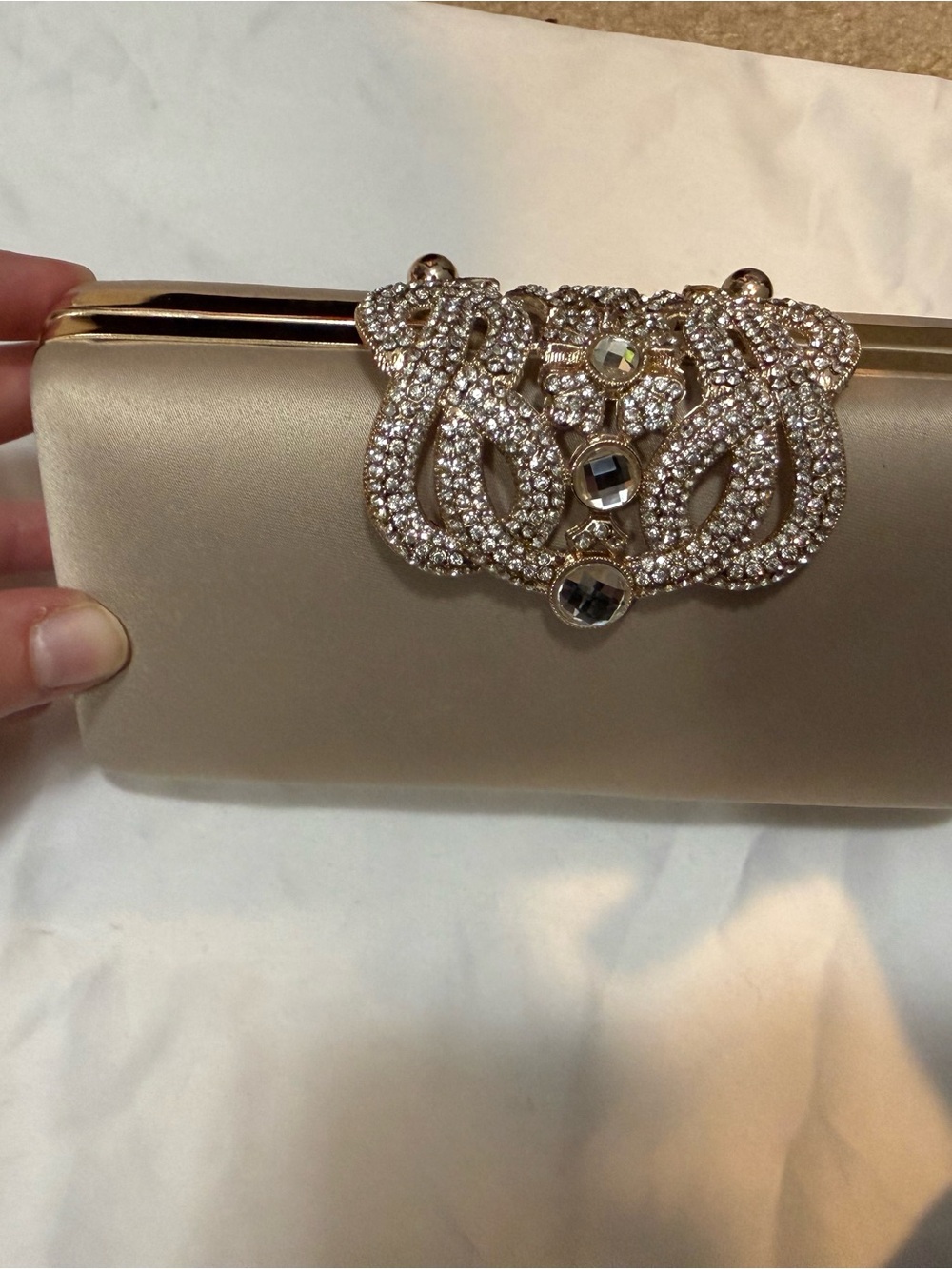 Elegant Champagne Satin Clutch with Crystal Brooch Accent